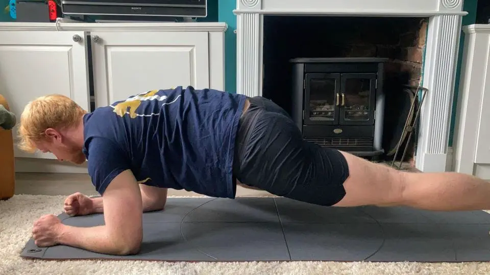 Harry Bullmore performs a breaststroke plank