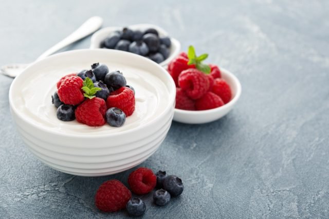 Bowl of healthy greek yogurt with fresh berries