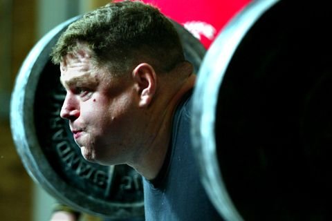 marshall 111002 brad gillingham, a world champion powerlifter, trains in a garage converted into a heavyweight gym with other power lifters in this photo gillingham engages in the squat lifting over 400 lbs of weight in a training set